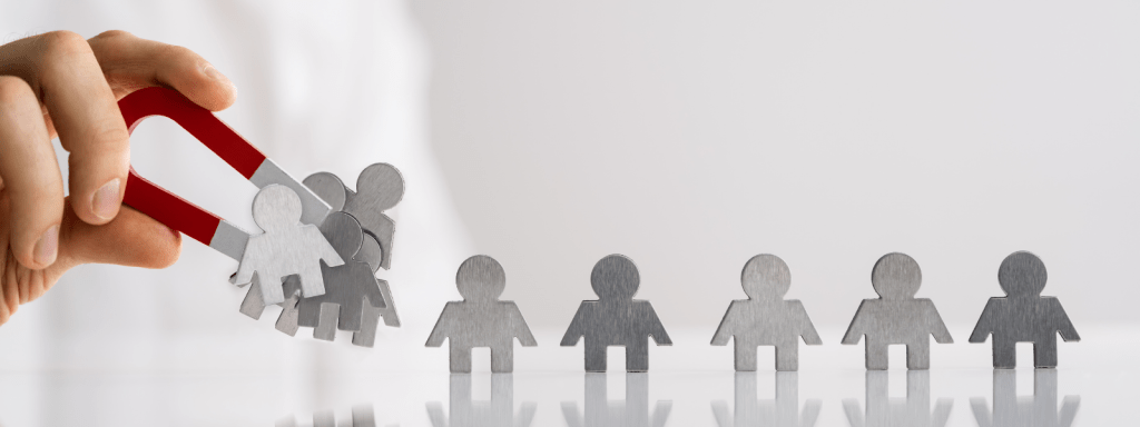 Hand met magneet trekt leads aan als lead magnet